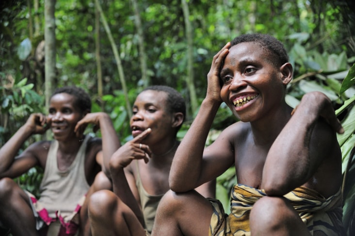 Three Pygmy people in the Congo