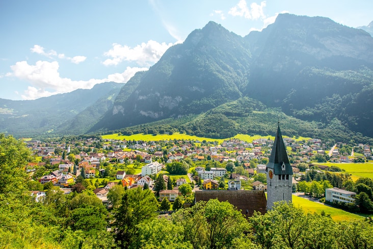 A village nestled among mountains in Liechtenstein