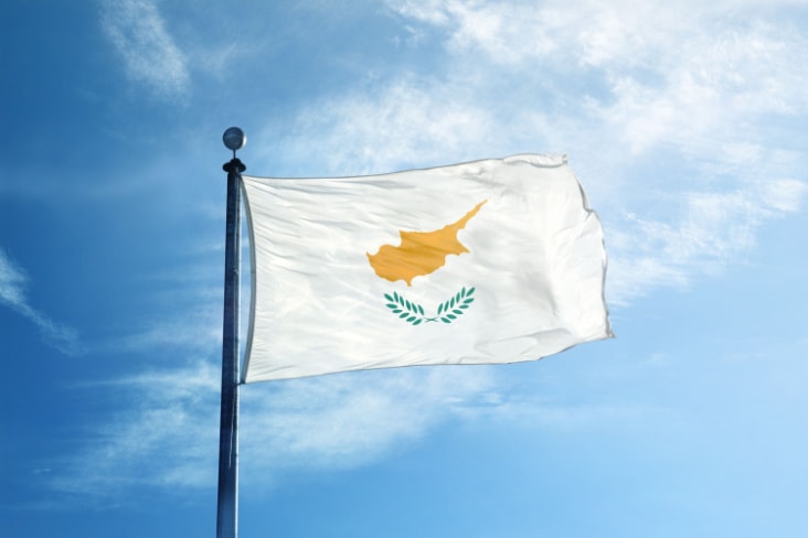 Cyprus flag flying against blue sky