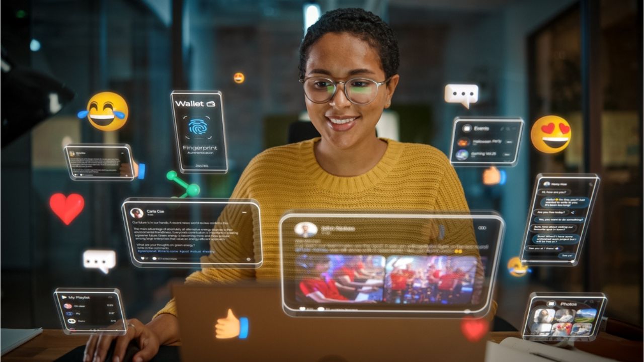 Augmented Reality Social Media Icons Appear From Worker's Laptop.