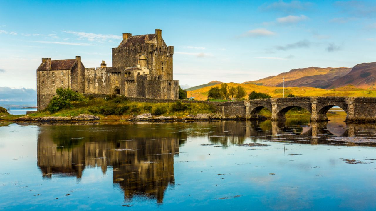Reflection of Eilean Donan Castle in the morning - Dornie, Scotland - United Kingdom