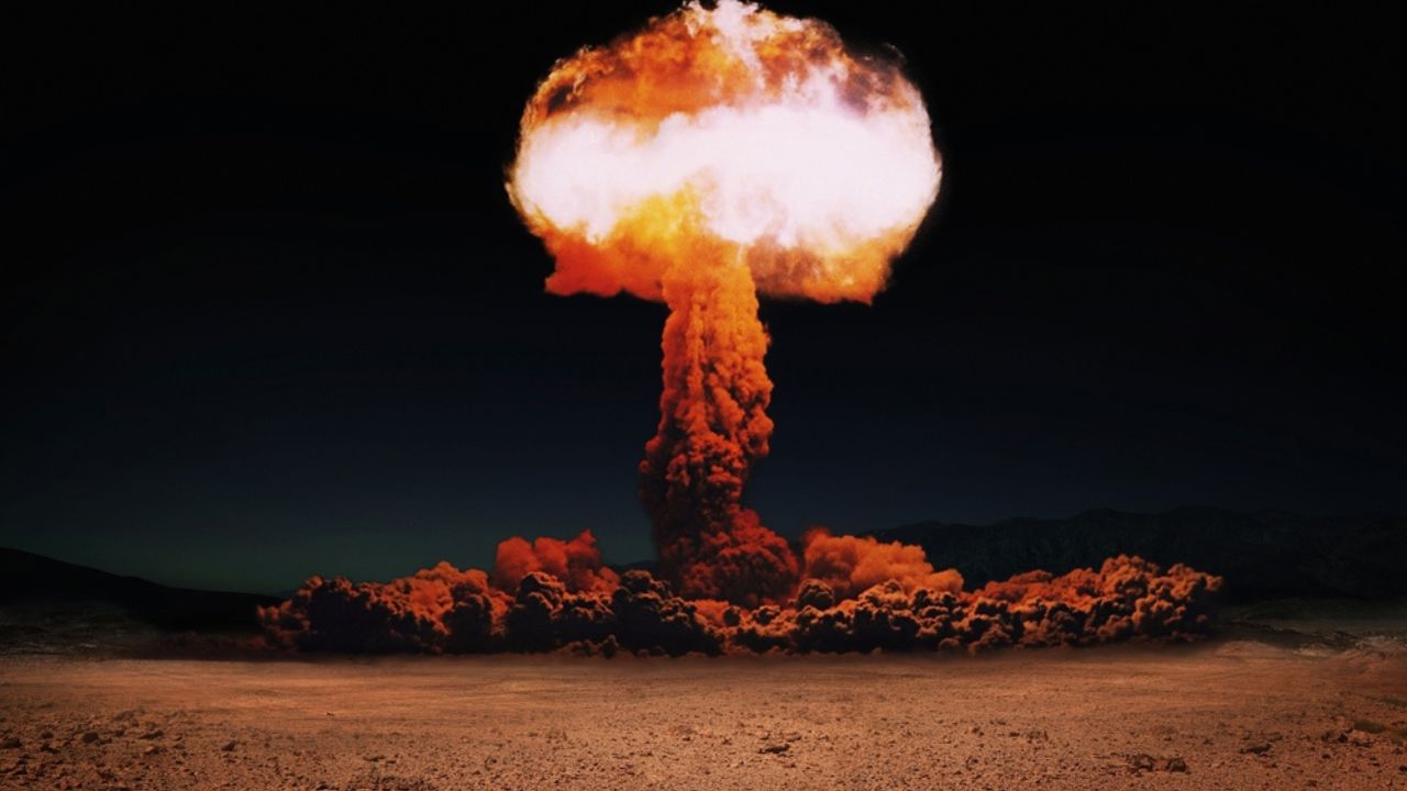nuclear bomb with a mushroom in the desert.