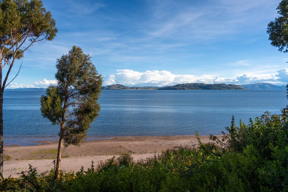 A scenic view of Lake Titicaca from Llachon